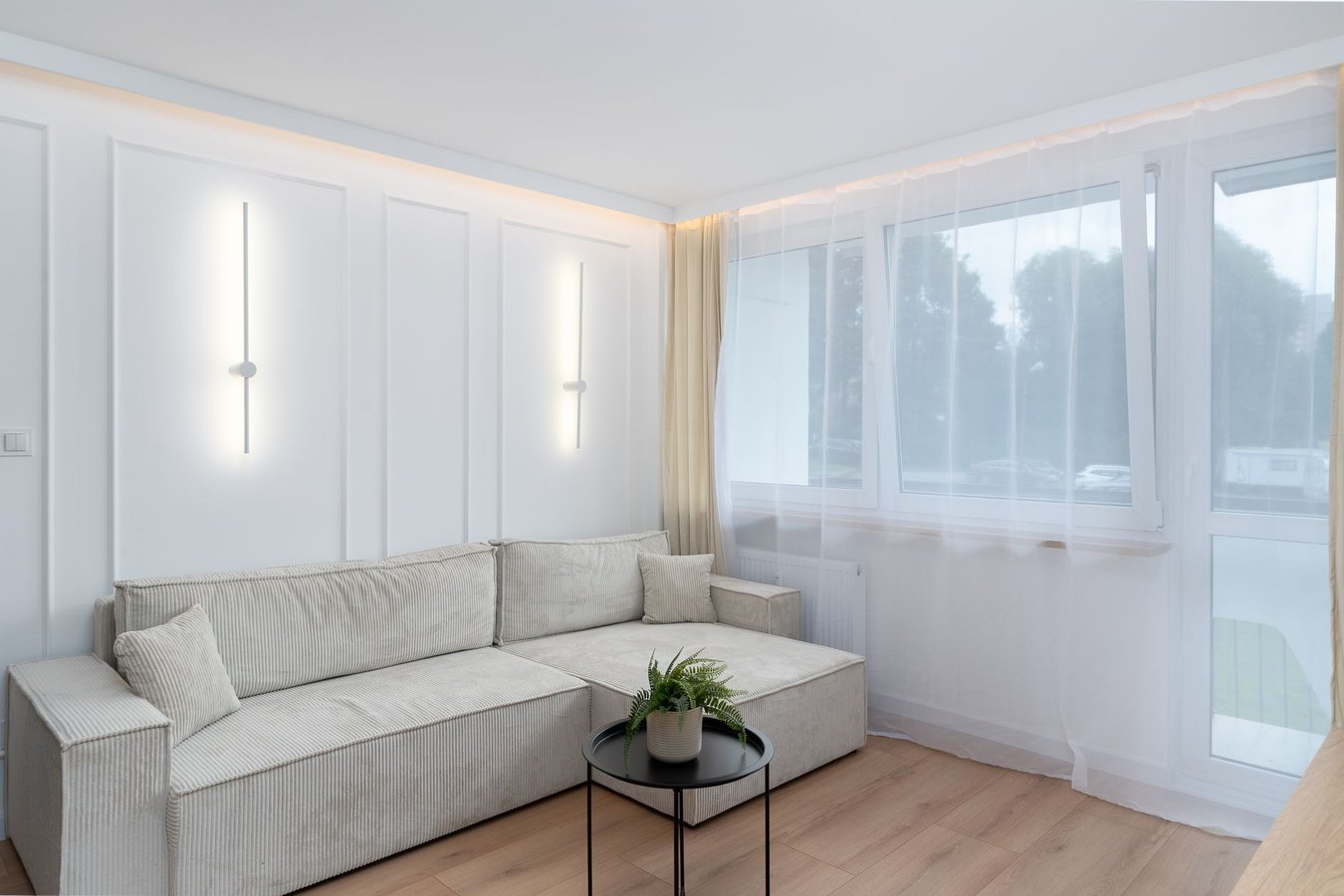 Flat-lay composition of sustainable materials including FSC-certified wood samples, natural linen fabric, and recycled metal hardware arranged on neutral background